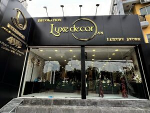 Thi công mặt dựng alu chữ nổi inox