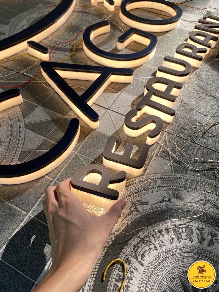 thi cong lap dat logo inox